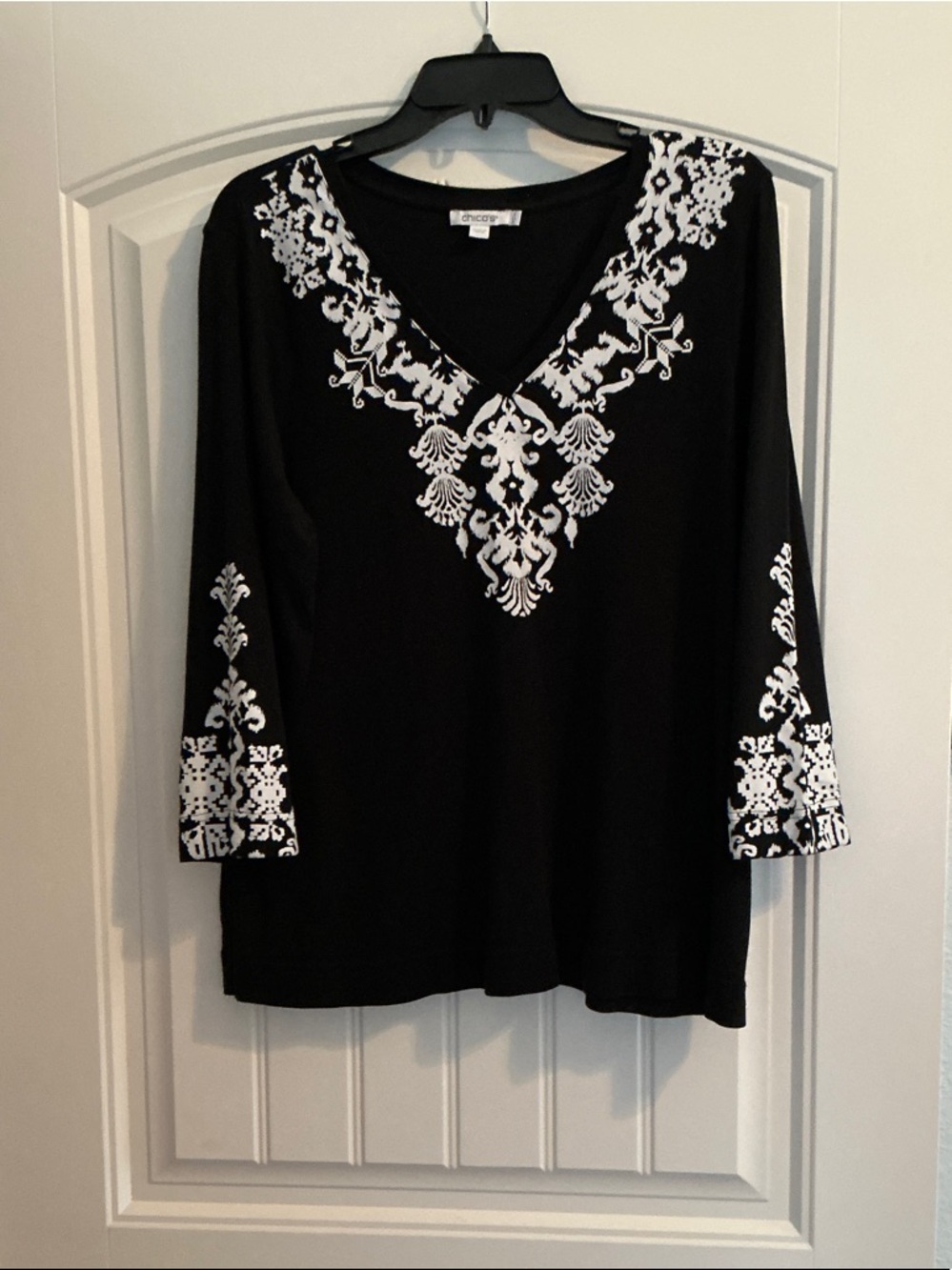 Chico's Black V-Neck Tunic with White Embroidered Motif